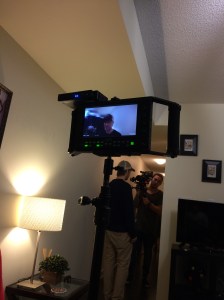 The DOP and AC discussing the shot